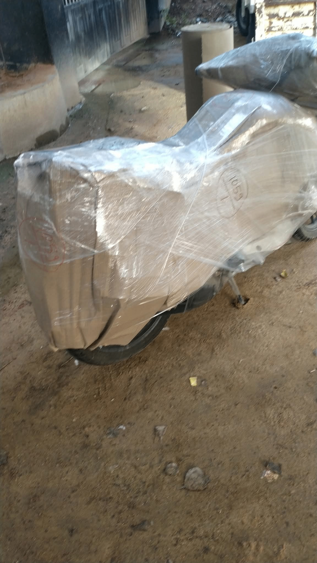 Bike fully wrapped and packed for transport